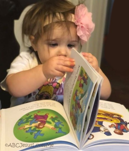 Child reading the Bible.