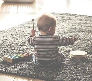 Child playing music.