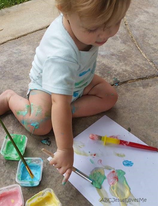 Child painting.